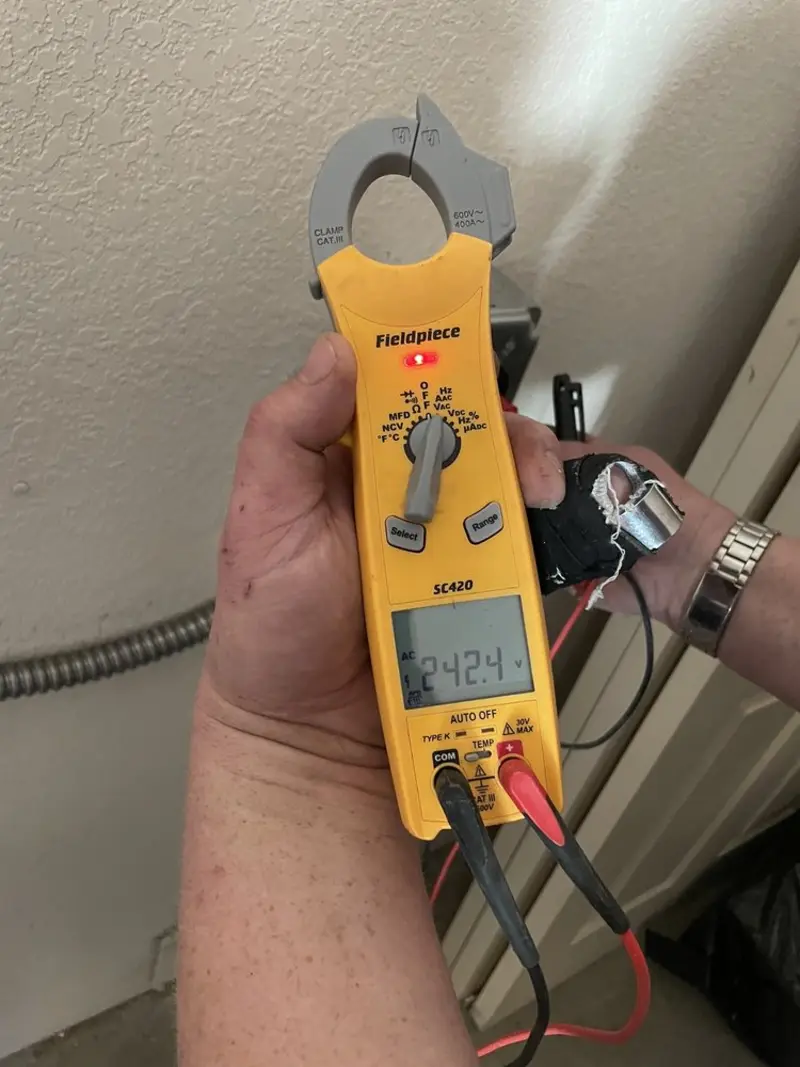 Voltage testing with clamp meter during Circuit Breaker Repair in Sodus
